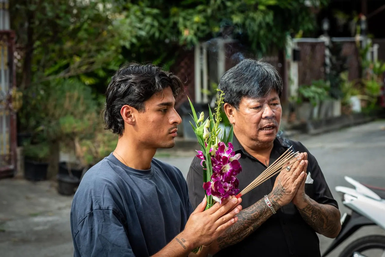 Offering flowers and incense with a member of our team before the ceremony